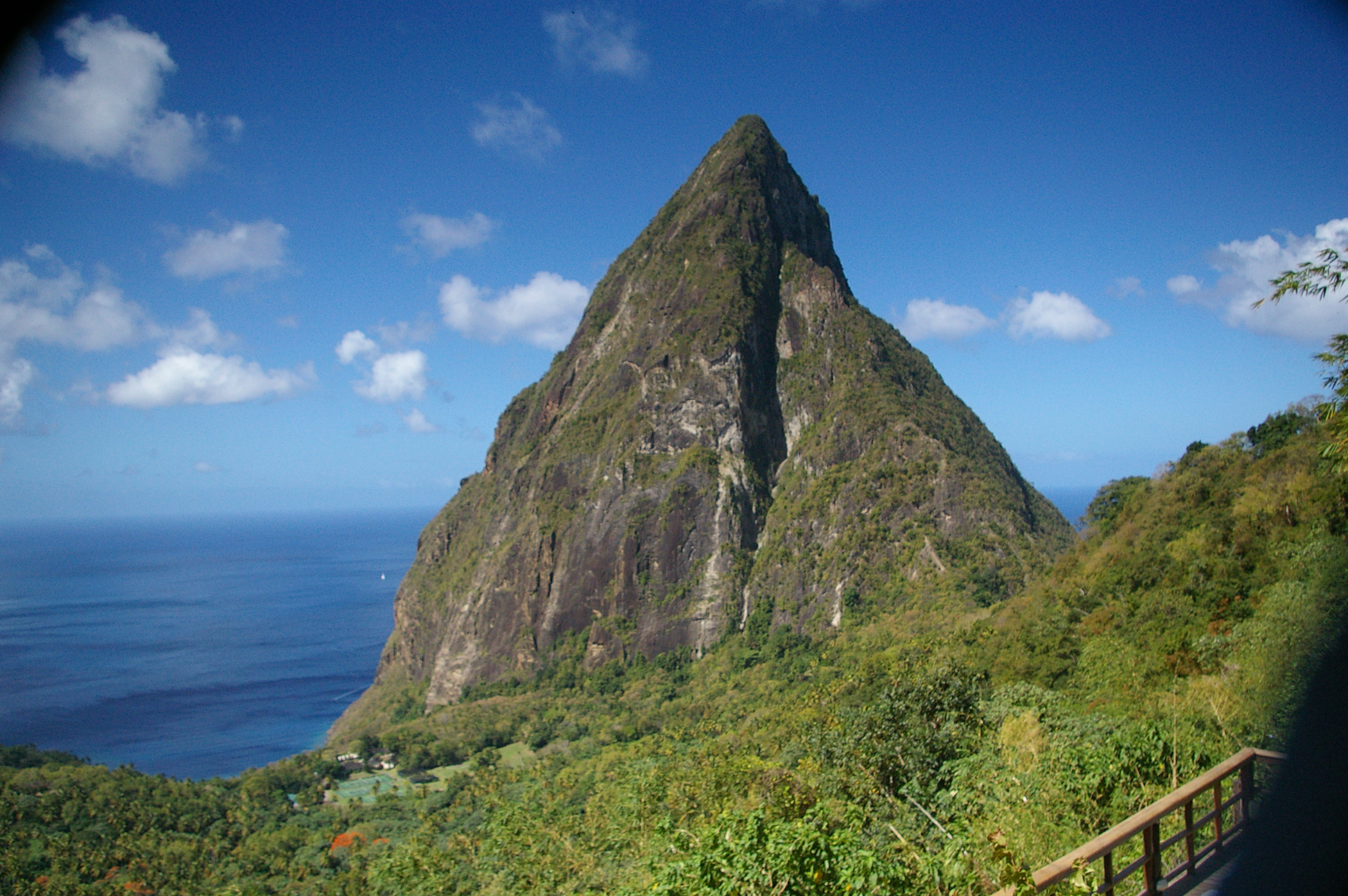 Petit Piton from the end of the hills that form the southern shore of Soufriere Bay